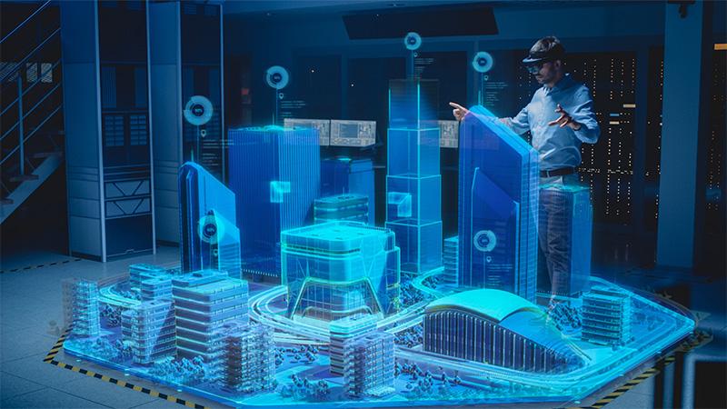 man staat met VR bril bij 3D model