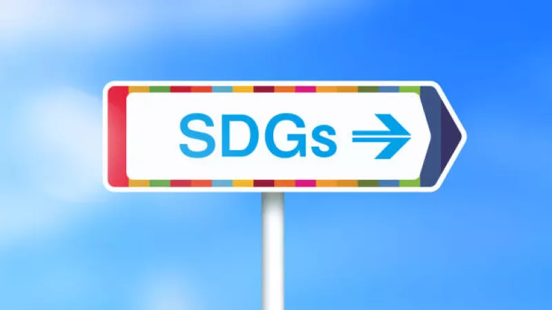 Bordje met de tekst SDG's en een pijl naar rechts